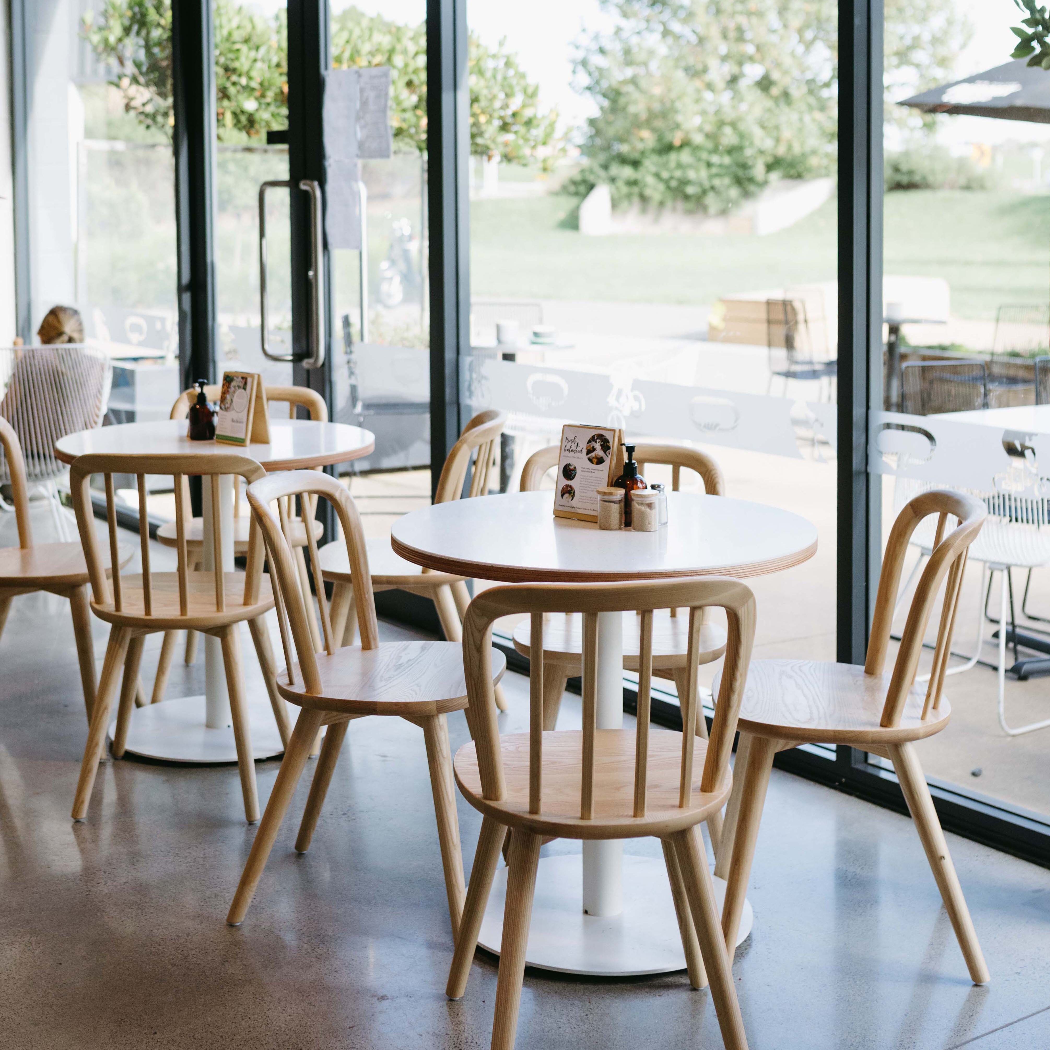 Bikey Cafe with clear timber cafe furniture