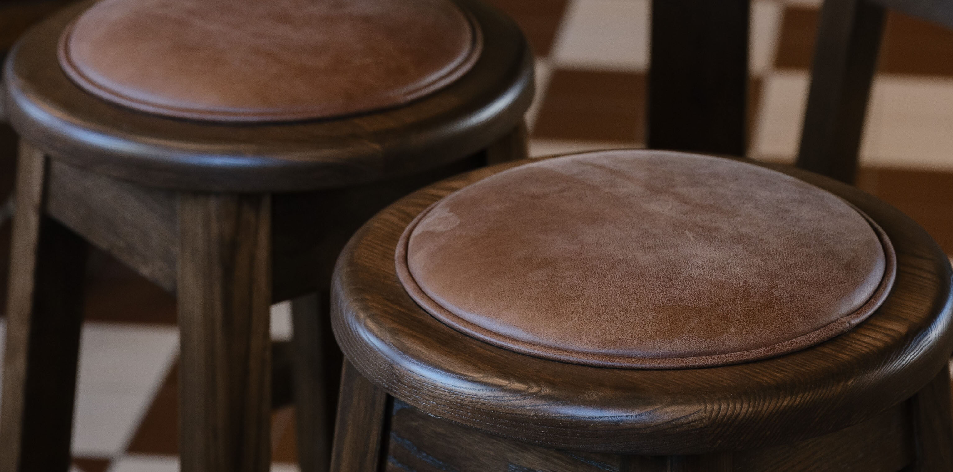 Upholstered Colorado Round Stools at Hotel Ponsonby 