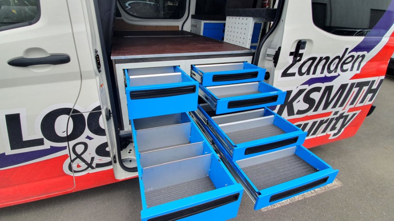Commercial van fitout with syncro system parts bins and drawers
